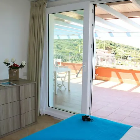 Sardinia Re - Attico Baja Ostina Ferienhaus