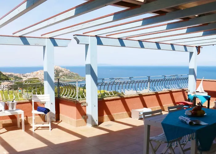 Ferienhaus Sardinia Re - Attico Baja Ostina